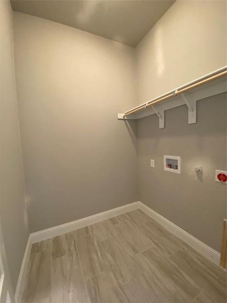Separate laundry room with no traffic through it with 12x24 tile Separate laundry room with no traffic through it with 12x24 tile