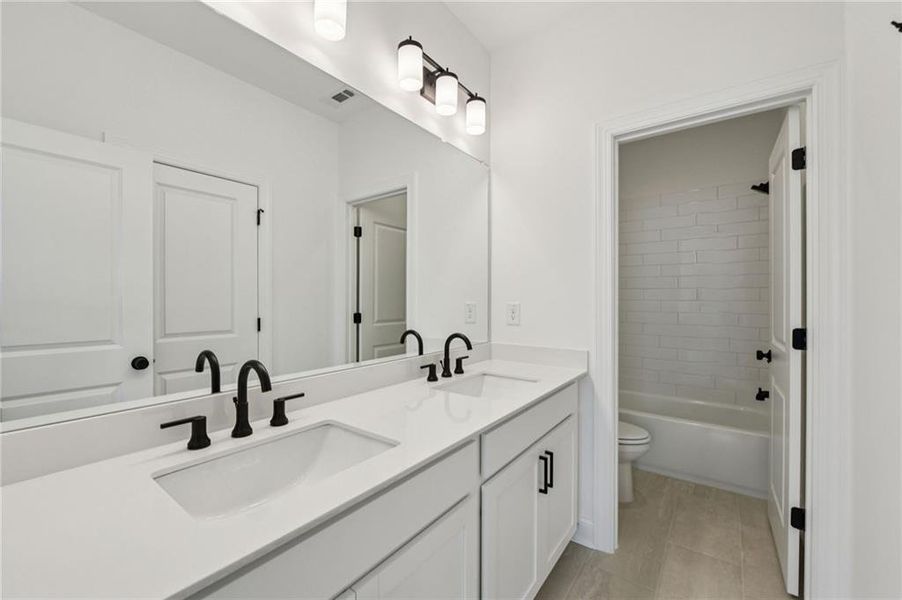 Furnished interior view inside a new home in Millcroft Townhomes, Buford (Image 11). Furnished interior view inside a new home in Millcroft Townhomes, Buford (Image 11).