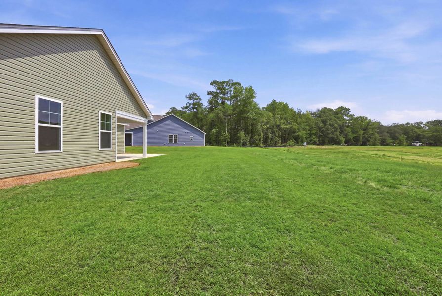 Exterior details and patio area of a home in Oak Grove, Conway (Image 17).