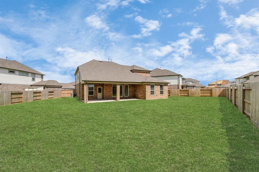 Backyard retreat, offering an abundance of space for kids to play and explore. The possibilities are endless in this outdoor haven, where the joy of open-air activities and family gatherings awaits.