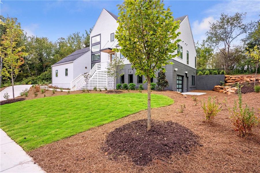 Front exterior of a new home in Aster, Roswell, GA, highlighting curb appeal (Image 2).