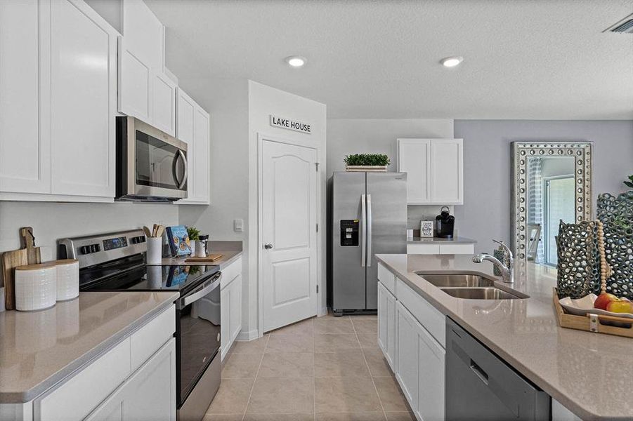 Furnished interior view inside a new home in , Winter Haven (Image 14). Furnished interior view inside a new home in , Winter Haven (Image 14).