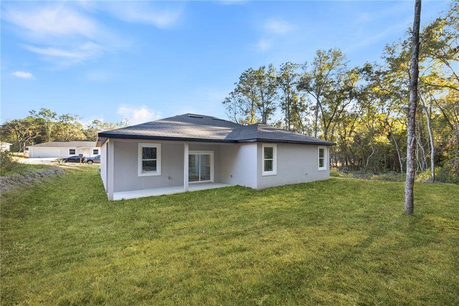 Exterior details and patio area of a home in , Citrus Springs (Image 23).