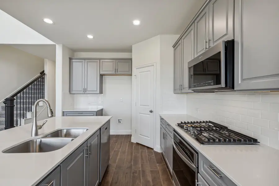 Representative furnished interior of a home built from the Isabella by Megatel Homes in Sicily, Princeton (Image 4).