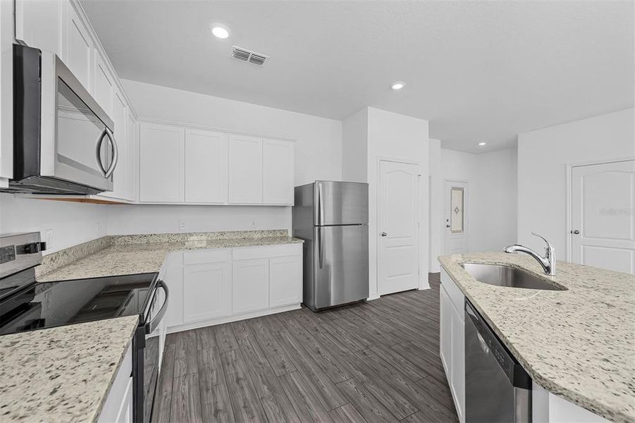 Furnished interior view inside a new home in Noah Estates at Tuscany Preserve, Poinciana (Image 5).