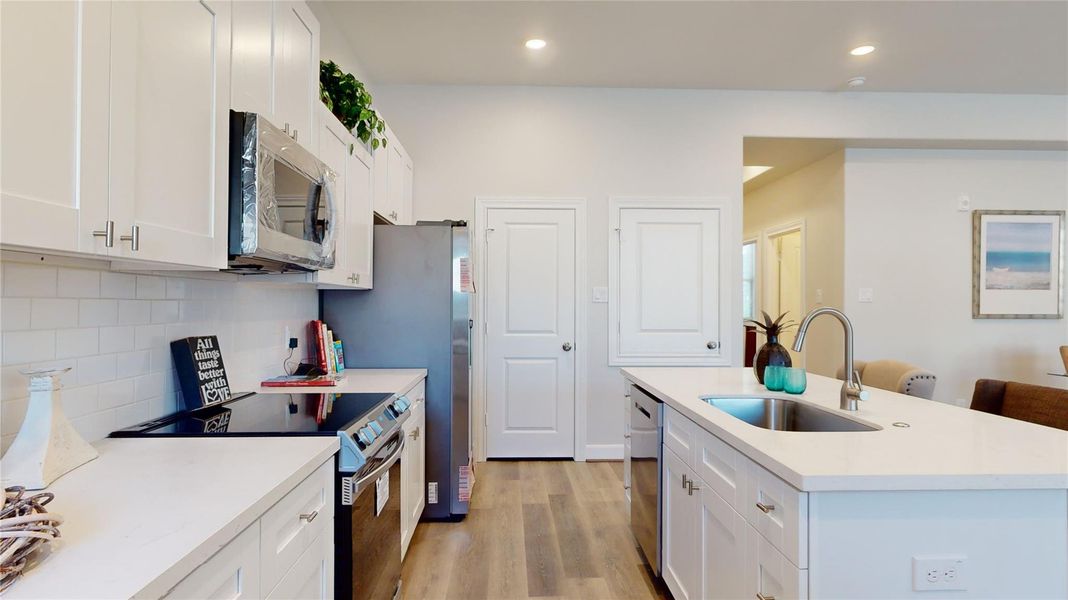 Furnished interior view inside a new home in , The Woodlands (Image 10).