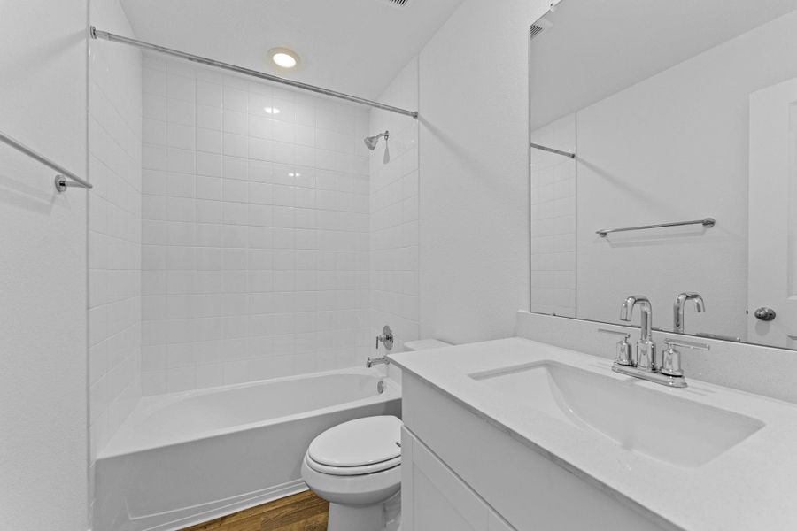 Furnished interior view inside a new home in Railhead, Cedar Creek (Image 9).