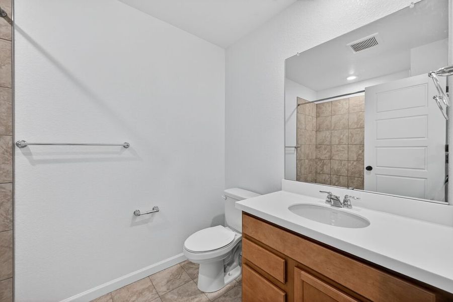 Furnished interior view inside a new home in Trailstone, Arvada (Image 7).