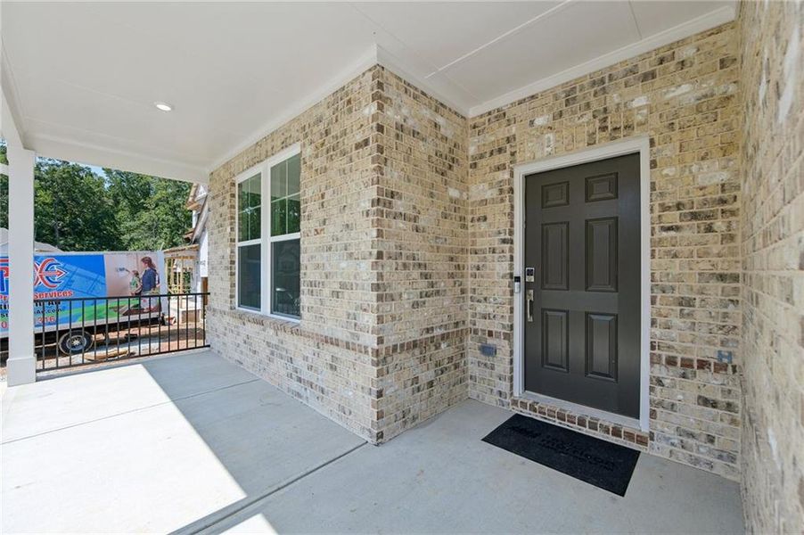 Exterior details and patio area of a home in Bailey Fence, Dacula (Image 33).
