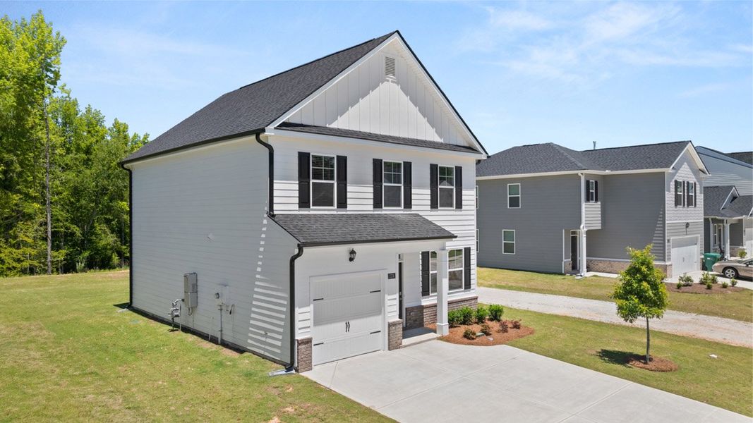 Front exterior of a new home in The Islands, Beech Island, SC, highlighting curb appeal (Image 2).