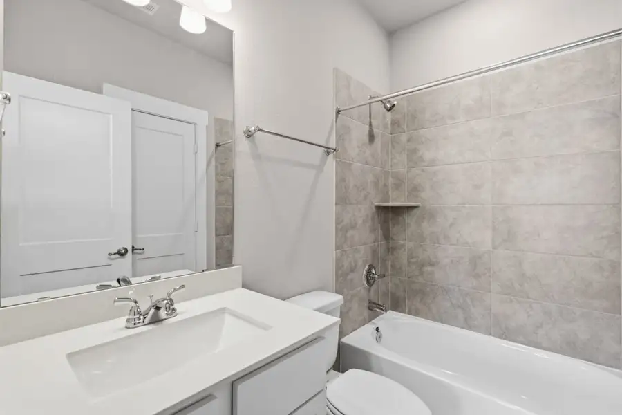 Furnished interior view inside a new home in Trinity Grove, Spring (Image 6).