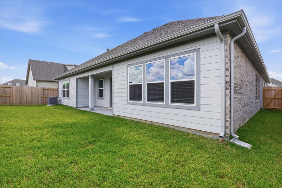 Exterior details and patio area of a home in , Alvin (Image 21). Exterior details and patio area of a home in , Alvin (Image 21).