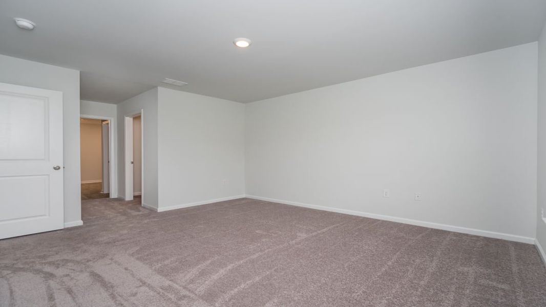 Representative unfurnished interior of a home built from the ARIA by D.R. Horton in The Meadows at Wildwood Village, Shallotte (Image 28). Representative unfurnished interior of a home built from the ARIA by D.R. Horton in The Meadows at Wildwood Village, Shallotte (Image 28).