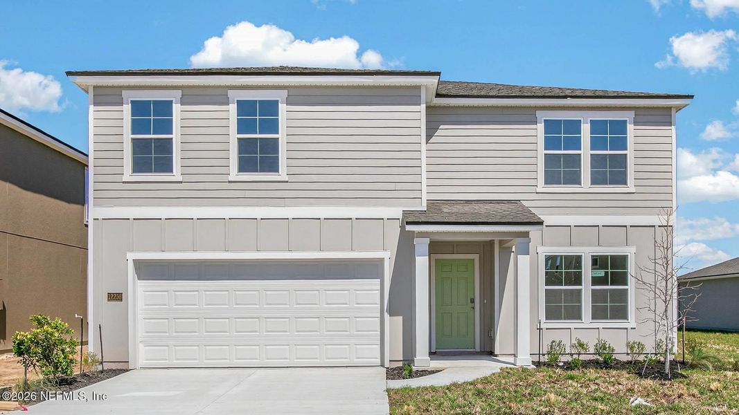 Front exterior of a new home in The Arbors, Jacksonville, FL, highlighting curb appeal (Image 1). Front exterior of a new home in The Arbors, Jacksonville, FL, highlighting curb appeal (Image 1).