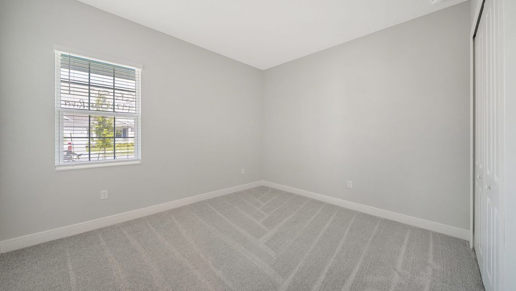 Spacious, unfurnished interior of a new home in Wildleaf at North River Ranch, Parrish (Image 26).