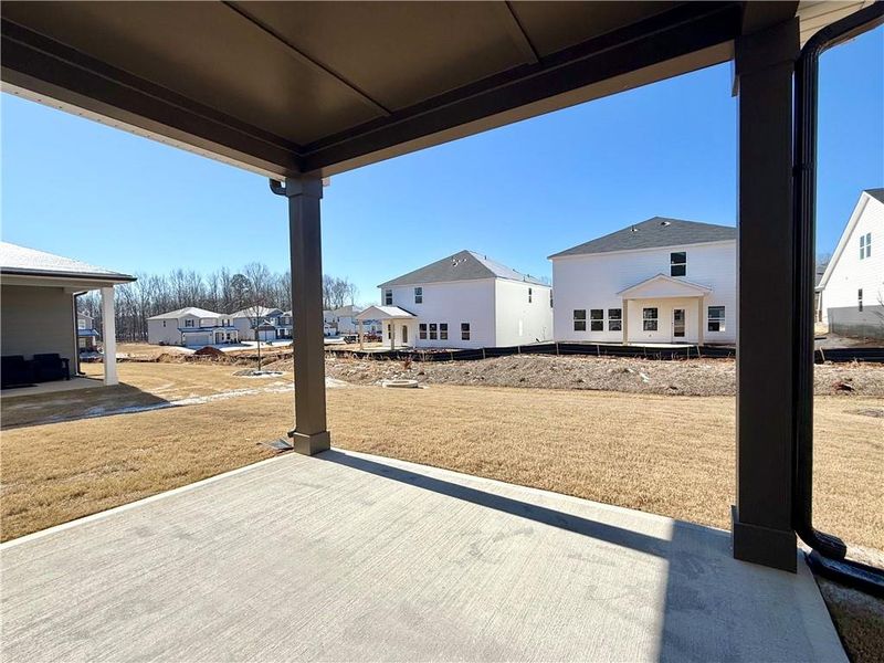Exterior details and patio area of a home in Vines at Mill Creek - Estate Series, Braselton (Image 3).