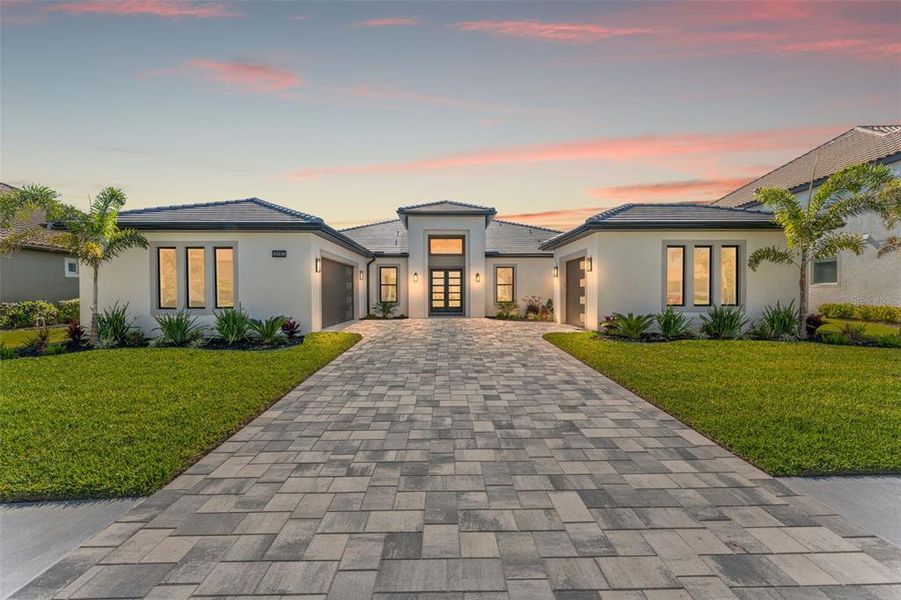 Front exterior of a new home in , Wesley Chapel, FL, highlighting curb appeal (Image 19). Front exterior of a new home in , Wesley Chapel, FL, highlighting curb appeal (Image 19).