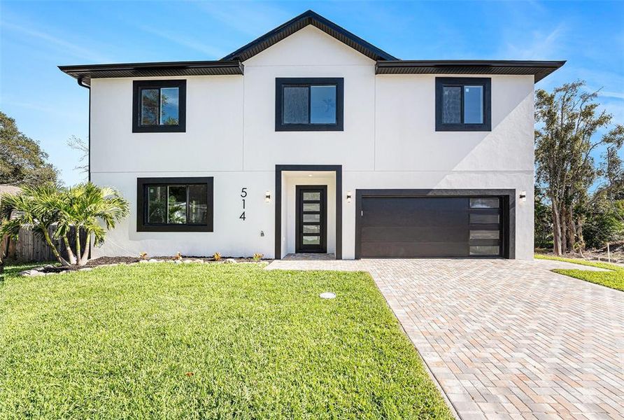 Front exterior of a new home in , Largo, FL, highlighting curb appeal (Image 19).