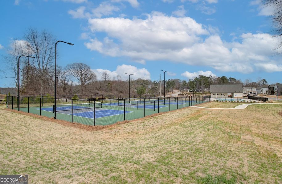 Front exterior of a new home in Ponderosa Farms Manor, Gainesville, GA, highlighting curb appeal (Image 27).
