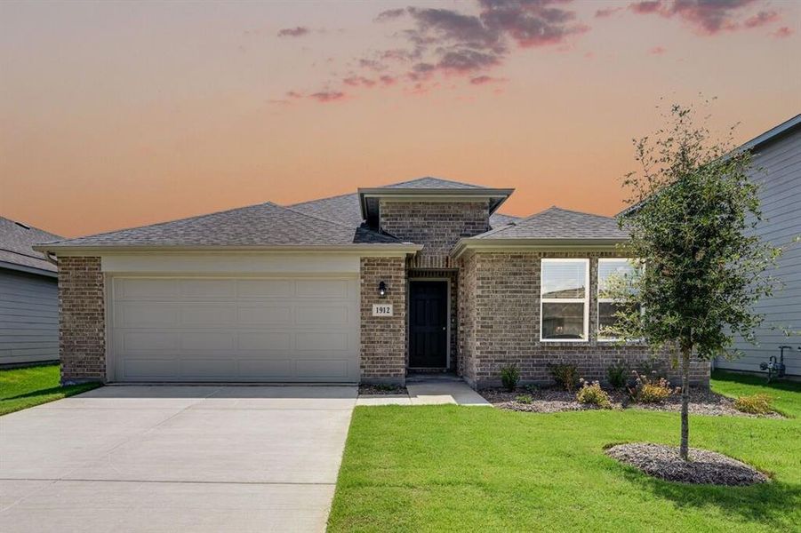 Front exterior of a new home in River Ridge, Crandall, TX, highlighting curb appeal (Image 2). Front exterior of a new home in River Ridge, Crandall, TX, highlighting curb appeal (Image 2).