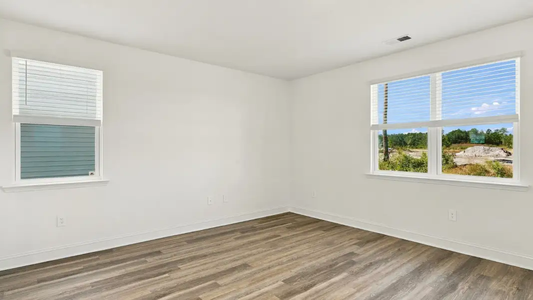 Spacious, unfurnished interior of a new home in The Lakes at North Glynn, Brunswick (Image 12).