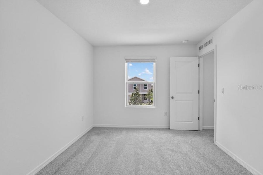 Spacious, unfurnished interior of a new home in Waterstone, Groveland (Image 27).