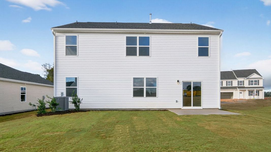 Exterior details and patio area of a home in Honeycutt Oaks, Angier (Image 16).