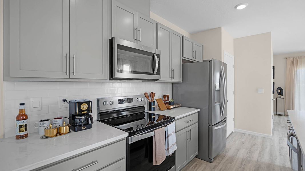 Furnished interior view inside a new home in Harmony at Lake Eloise, Winter Haven (Image 9).