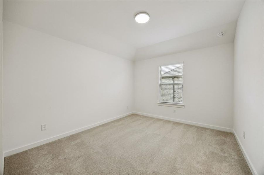 Bedroom in the Monet II home plan by Trophy Signature Homes – REPRESENTATIVE PHOTO