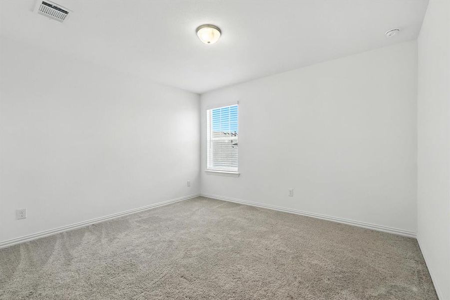 Bedroom 4 also on top floor with window and walk in closet