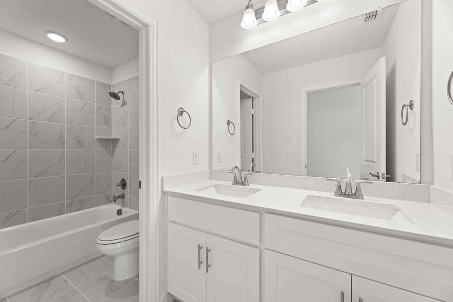 Representative furnished interior of a home built from the Salado by UnionMain Homes in Legacy Hills, Celina (Image 12).