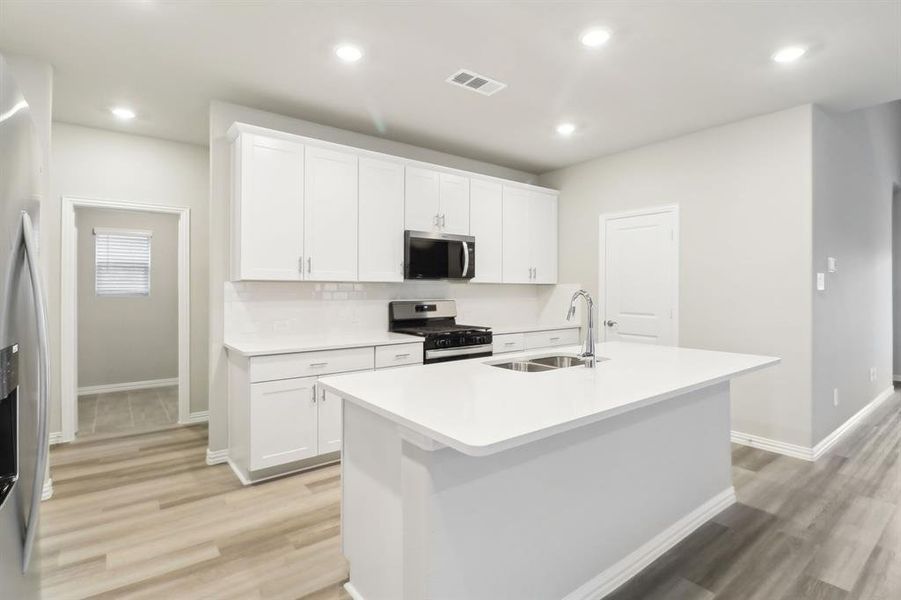 Photo is not of the actual home, but is an inspirational photo of builder’s model home and may depict options, furnishings, and/or decorator features that are not included.