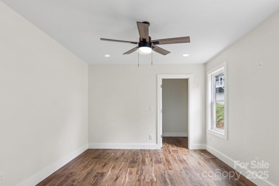 Spacious, unfurnished interior of a new home in , Waynesville (Image 35).