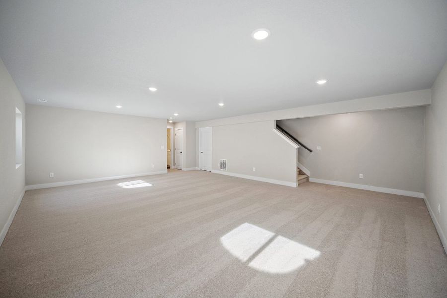 Spacious, unfurnished interior of a new home in The Glen, Colorado Springs (Image 32).