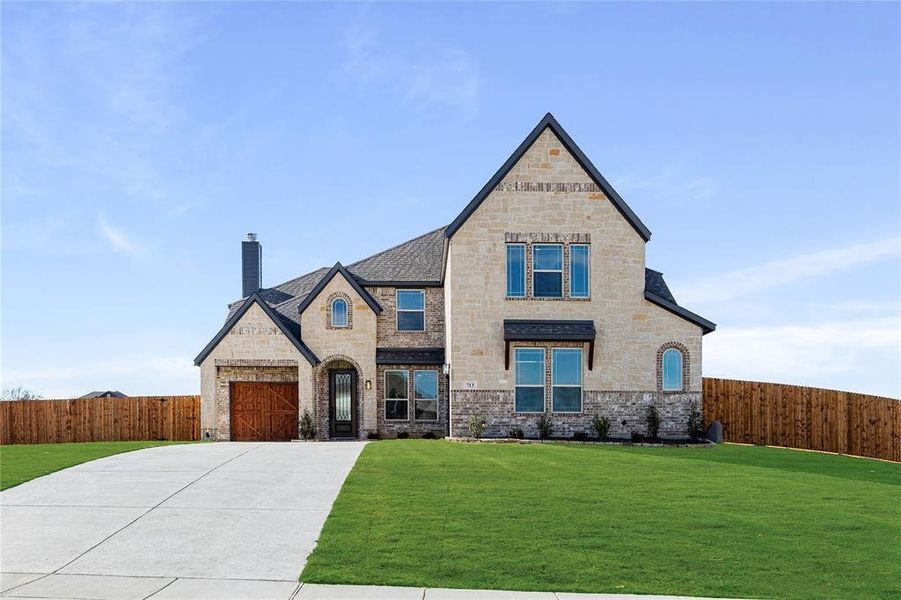 Front exterior of a new home in Crystal Lake Estates, Red Oak, TX, highlighting curb appeal (Image 2).