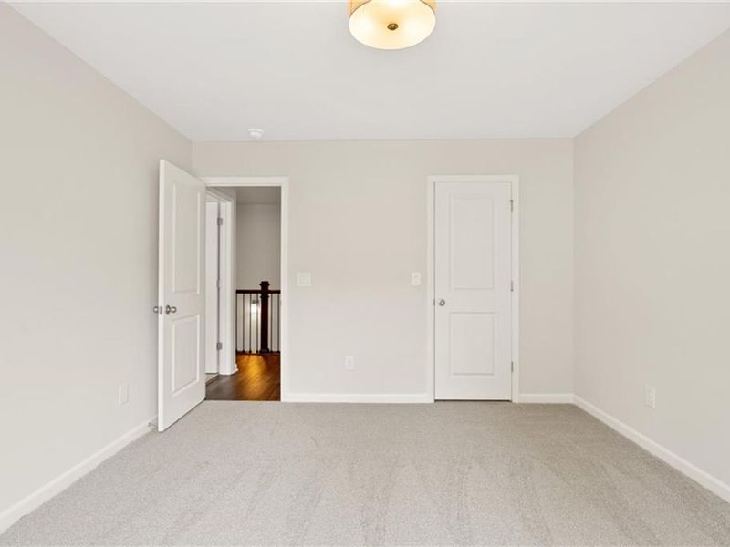 Spacious, unfurnished interior of a new home in The Village at Shallowford, Kennesaw (Image 28).