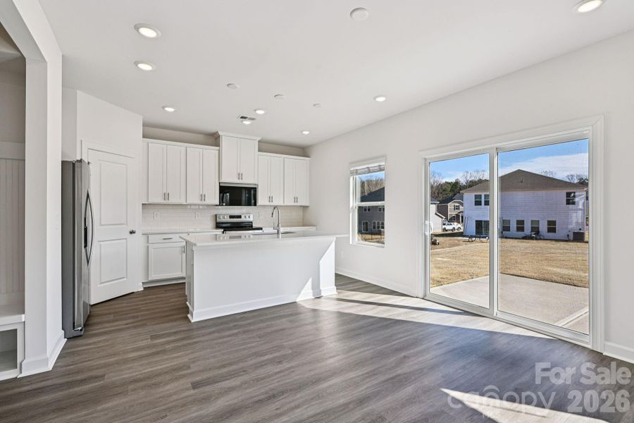 Furnished interior view inside a new home in Harper Landing, Stanley (Image 4).