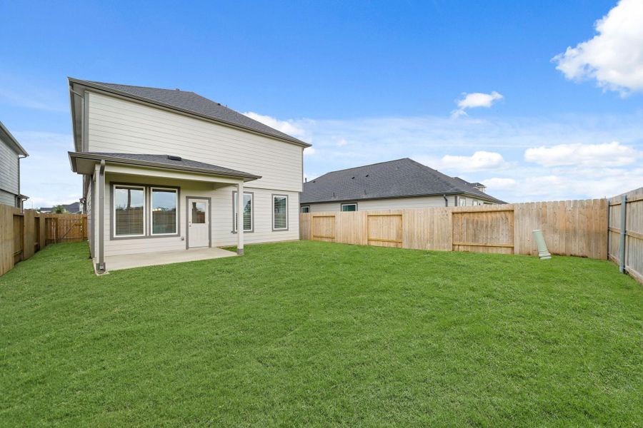 Exterior details and patio area of a home in , Houston (Image 2). Exterior details and patio area of a home in , Houston (Image 2).