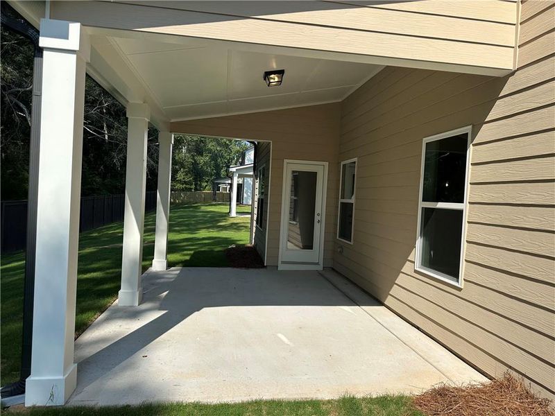 Front exterior of a new home in Rosewood Lake Estates, Hoschton, GA, highlighting curb appeal (Image 53).