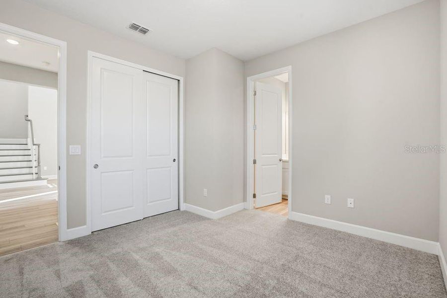 Spacious, unfurnished interior of a new home in Palms at Coasterra, Palmetto (Image 30).