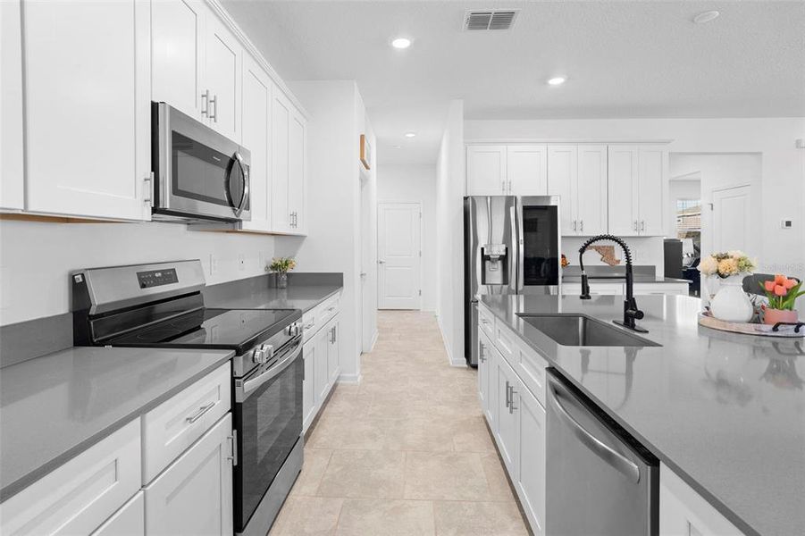 Furnished interior view inside a new home in Rhett's Ridge: Legacy Collection, Apopka (Image 12).