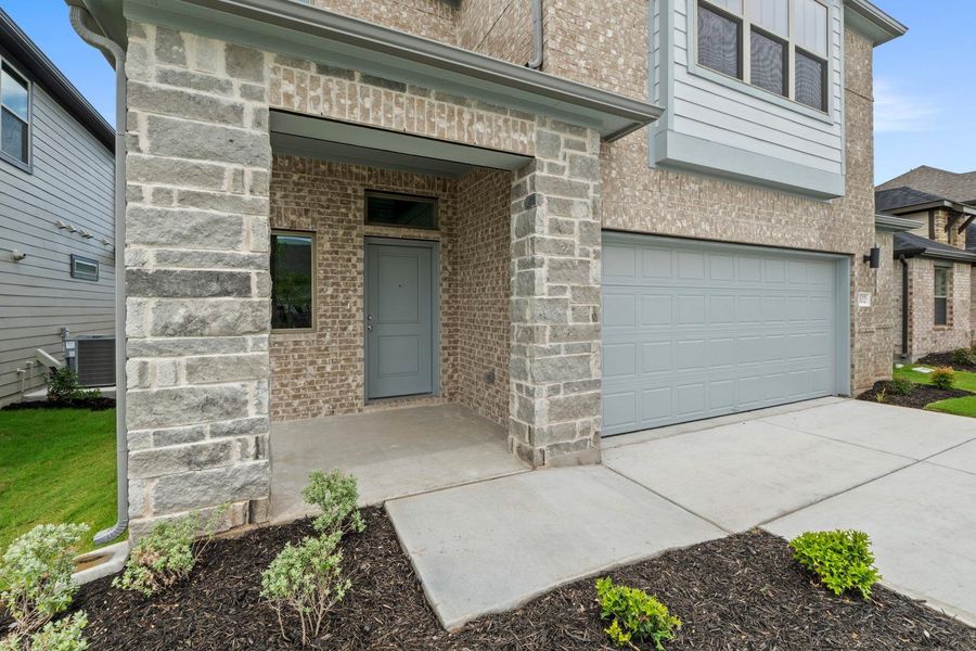 Exterior details and patio area of a home in Prairie Winds, Hutto (Image 3).