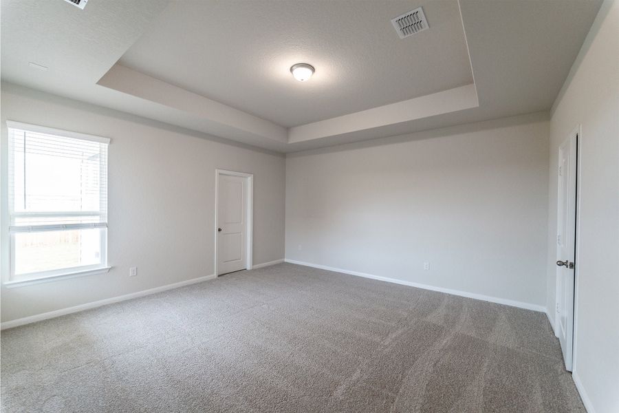 Spacious, unfurnished interior of a new home in The Woodlands at Medina Hills, Mico (Image 15).