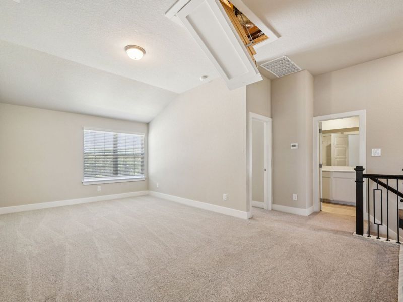 Second floor landing in the Red River floorplan at a Meritage Homes community.