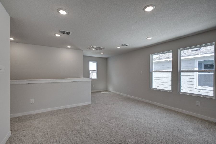 A room with a few windows.