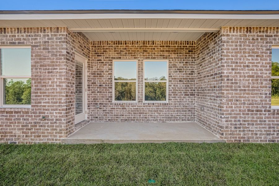 Exterior details and patio area of a home in Blossom Grove, Crestview (Image 21).