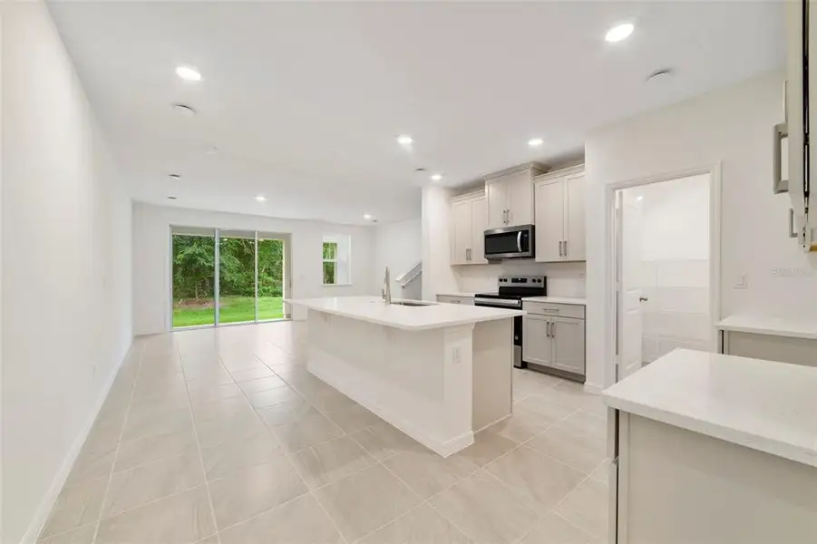 Furnished interior view inside a new home in Towns at Greenleaf, Oviedo (Image 5).