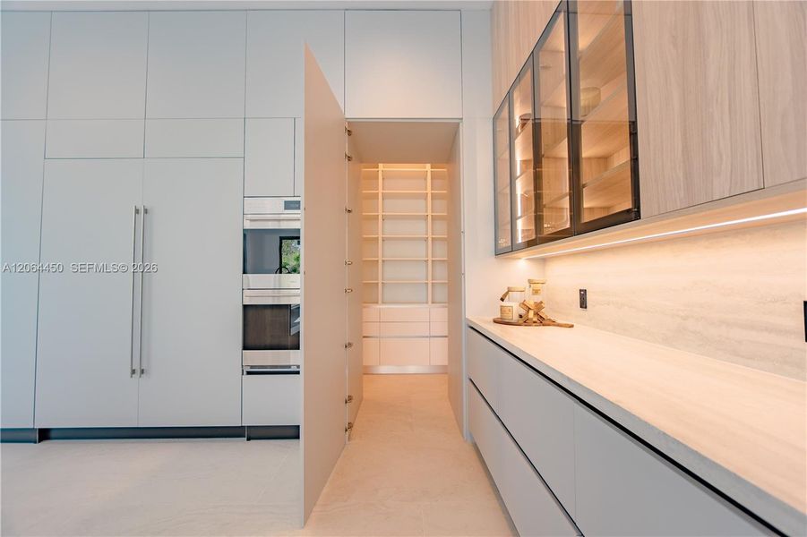 Butler's pantry with built-in cabinetry