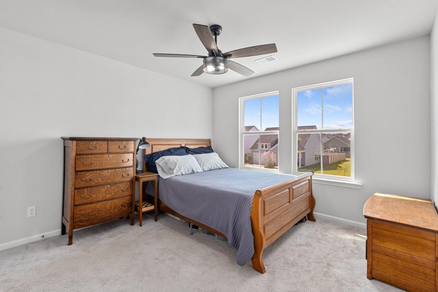 Furnished interior view inside a new home in Sweetgrass at Summers Corner, Summerville (Image 38).