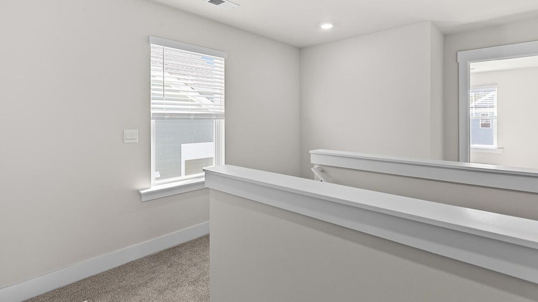 Spacious, unfurnished interior of a new home in The Haven at Indigo Preserve, Leland (Image 21).